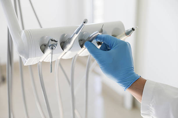 Professional Invisalign Clear Aligners technician working in North St. Paul, MN